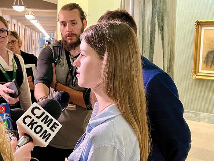 Knyhnytska answering reporters’ questions on the impact the change will have on her.